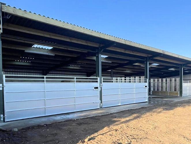 Equine Youngstock Barn & Feeding Gates New equestrian younstock barn delivered and installed.