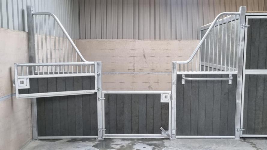 Prestige Stables Installed in Scotland Prestige stables and tack room including roof, nicely finished off with grey recycled plastic. Environmentally Friendly.