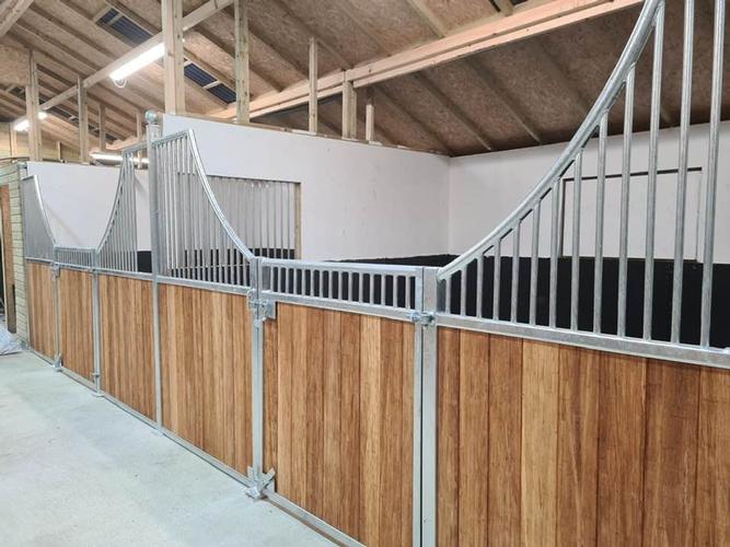 American Barn Stables Stable fronts with fitted hay bars and hay doors for easy feeding.